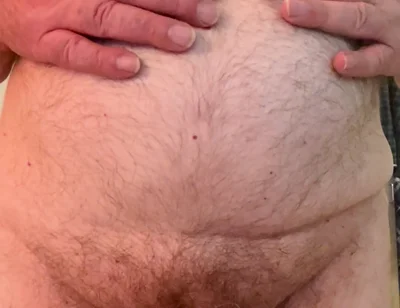 Coach Karl Rubs His Belly 6811