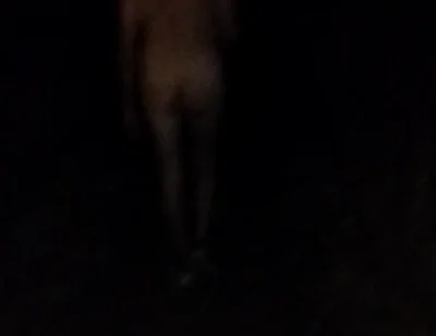 Naked Walking on the Hill Along Highway