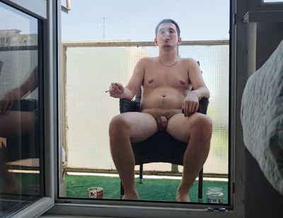 Exhibitionist Enjoys His Cigarette and Coffee Naked on the Balcony