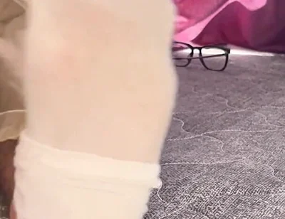 A University Rests Her Feet on Her Face so That the Adorers