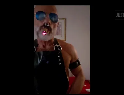 Stepdad lighting his Cigar in rubber apron