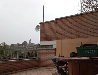 On the Terrace, in the Rain