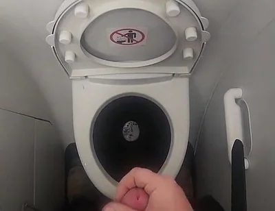 Airplane Bathroom Jerk and Cum.
