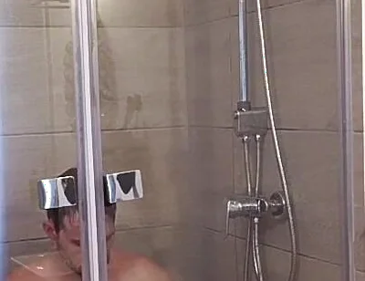 After a Full Day on the Road Wet Solo in the Hotel Shower