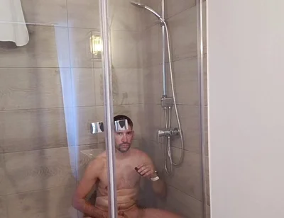 After a Full Day on the Road Wet Solo in the Hotel Shower