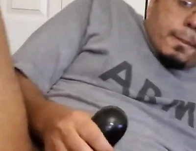 Browndicksavior Using His Oral Sex Toy and Stroking His Brown Cock