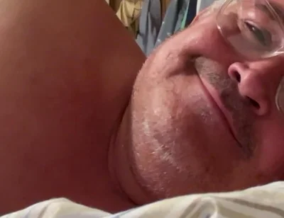 Man Lying in Bed