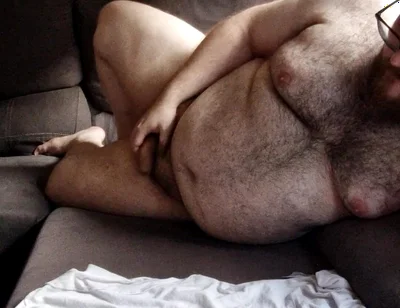 Fat Hairy Jerks off While Watching Porn