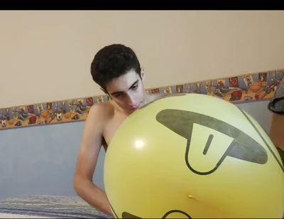 Blowing up a Huge Smiley Balloon While Jerking off