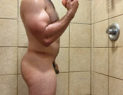 Muscle Cub with Dildo in Gym Showers