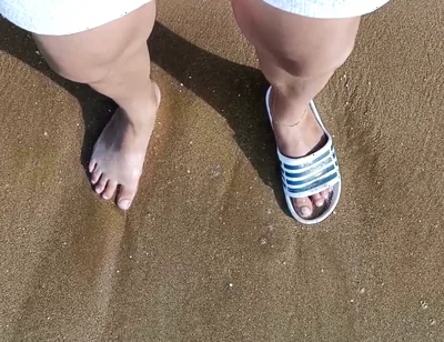 Feet and the Sea Extra Slowmotion - One Foot Barefoot and Foot in Slide - Great Feet in Sea