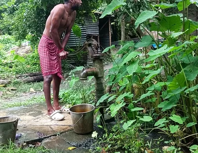 Tha naked Indian mature man shower in open place and showing body and dick..