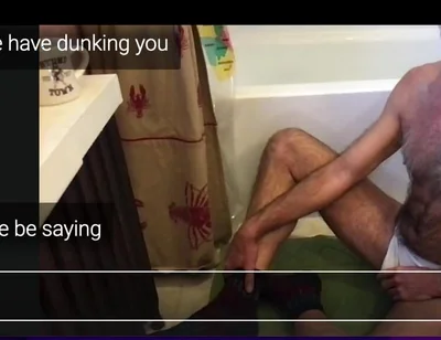 Guy Getting Dunked in a Tub.