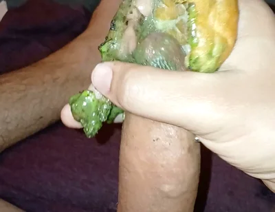 Enjoying a Donut with Haloween Decoration.