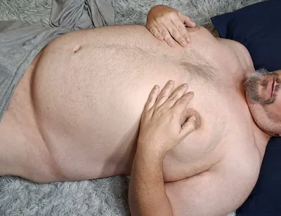 Chubby Guy Lays on Floor and Cums