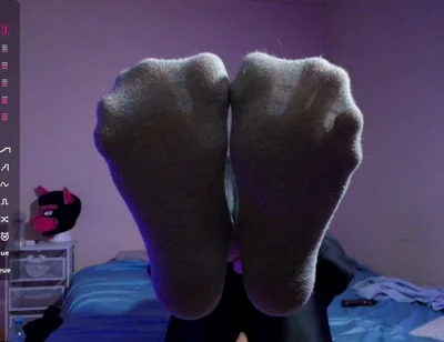 Puppy Keeps Teasing You with His Socks and Bare Paws