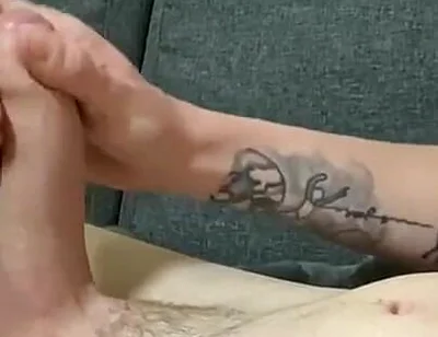Naked Twink Lays on Sofa Stroking Huge Uncut Cock Until Cumming on Ripped Abs - Amateur Solo