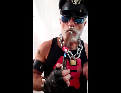 Leather Stepdad Lighting a Big Ring