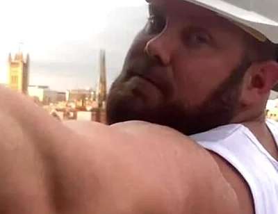 Builder Iron Bending Muscle Flexing and Measuring