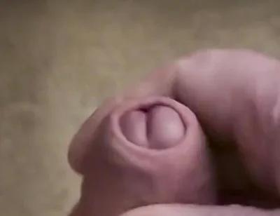 My Friend Sits in a Chair and Jerks off His Cock While Watching Video