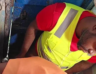 Construction Site Bathroom and Workers