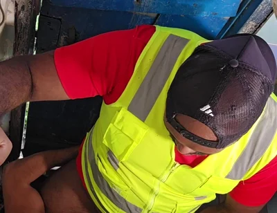 Construction Site Bathroom and Workers