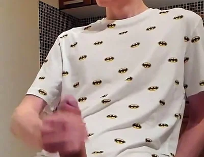 Sweet load of cum flows from this cute guy's big cock