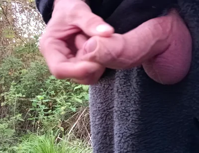 Moaning Squirting Cumshot Wanking in the Woods Wearing Onesie